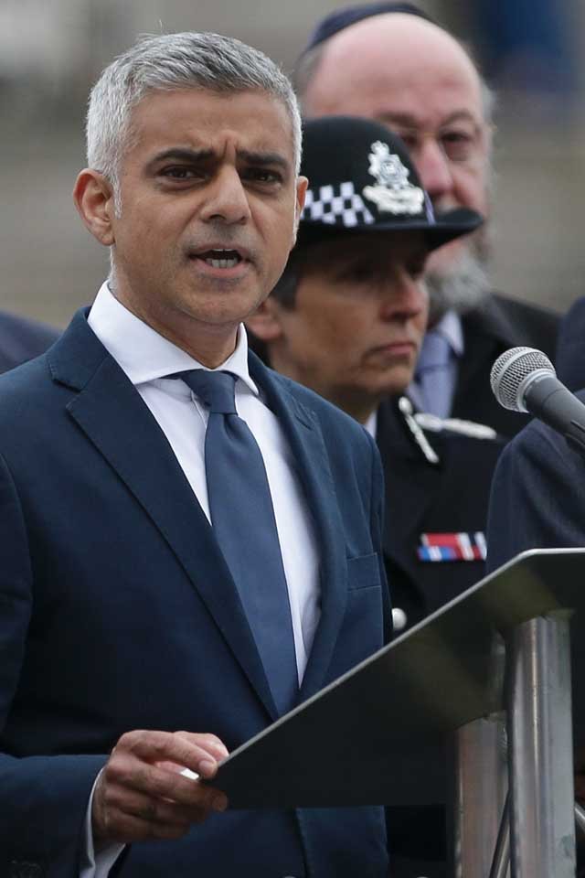 london mayor sadiq khan speaks during a vigil in potters fields park in london on june 5 2017 to commemorate the victims of the terror attack on london bridge and at borough market that killed seven people on june 3 photo afp