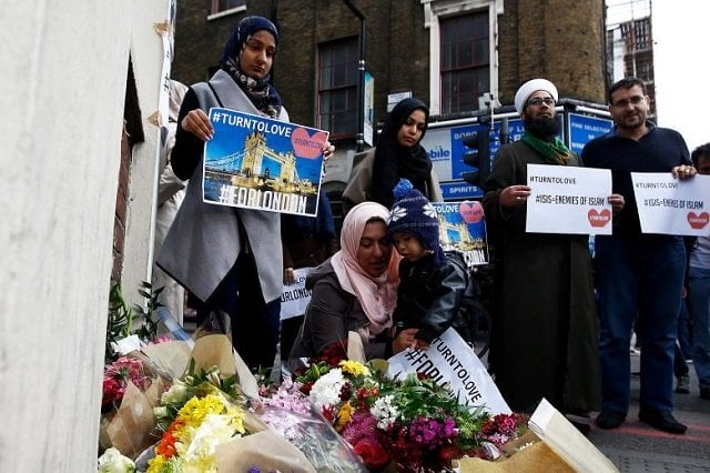 muslims pray at a floral tribute near london bridge photo reuters