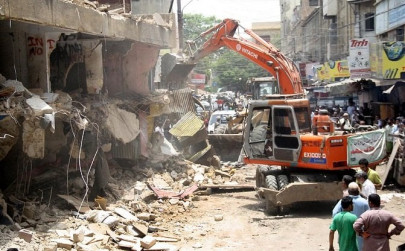 118 illegal shops on ma jinnah road demolished