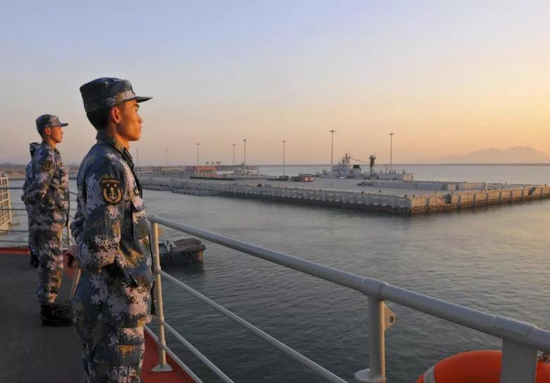 chinese naval soldiers stand guard on china 039 s first aircraft carrier liaoning as it travels towards a military base in sanya hainan province photo reuters chinese naval soldiers stand guard on china 039 s first aircraft carrier liaoning as it travels towards a military base in sanya hainan province photo reuters