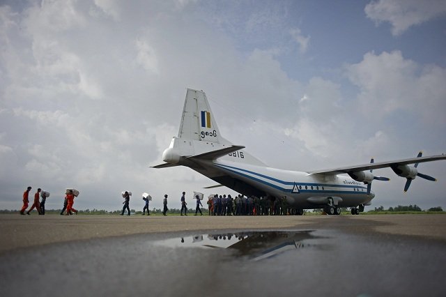 this file photo taken on august 5 2015 shows a myanmar air force shaanxi y 8 transport aircraft being unloaded at sittwe airport in rakhine state similar to the aircraft carrying over 100 people that went missing between the southern city of myeik and yangon on june 7 2017 a myanmar military plane carrying at least 104 people went missing on june 7 2017 between the southern city of myeik and yangon the army chief 039 s office said as ships scoured the andaman sea for the aircraft photo afp