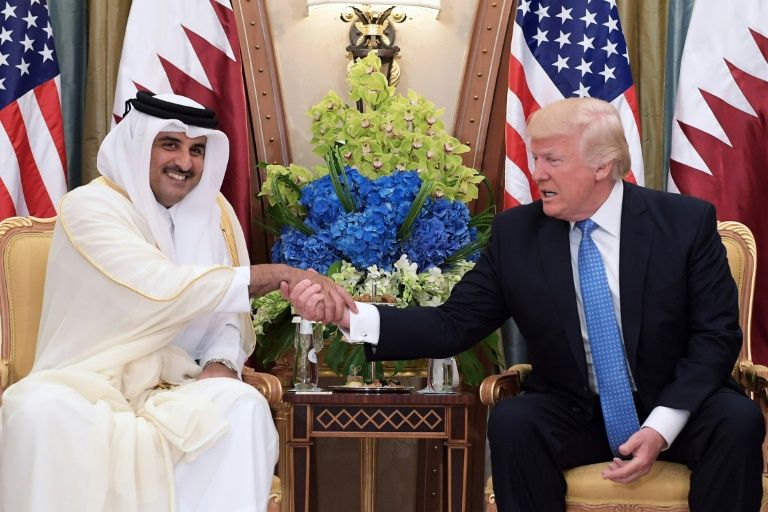 us president donald trump r shakes hands with qatar 039 s emir sheikh tamim bin hamad al thani in the saudi capital riyadh on may 21 2017 photo afp