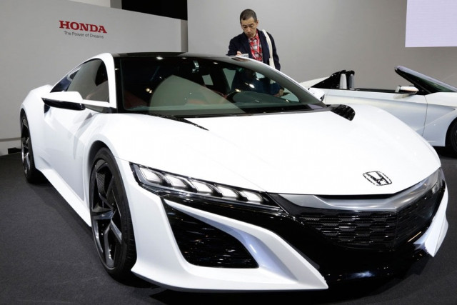 automotive industry moving rapidly into electric and self driving cars photo afp automotive industry moving rapidly into electric and self driving cars photo afp