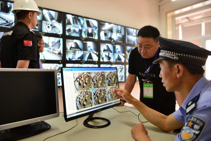 a police officer monitors examination venues as students sit for china 039 s national college entrance exam known as quot gaokao quot in tianjin china photo reuters