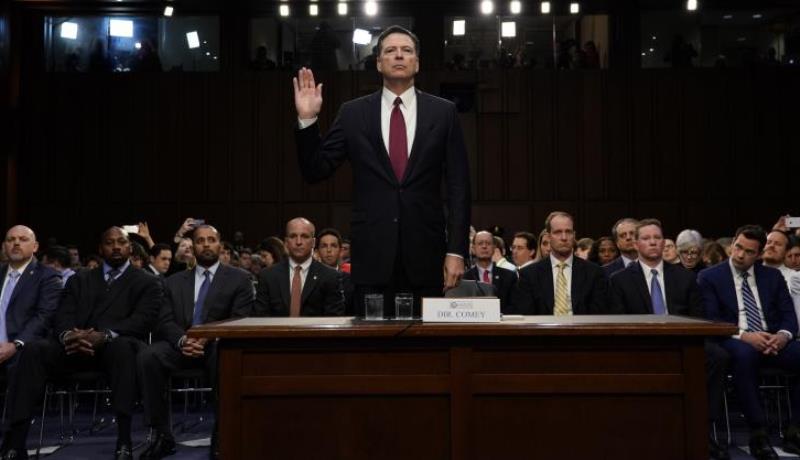 former fbi director james comey is sworn in prior to testifying before a senate intelligence committee hearing on russia 039 s alleged interference in the 2016 us presidential election on capitol hill in washington on june 8 2017 photo reuters