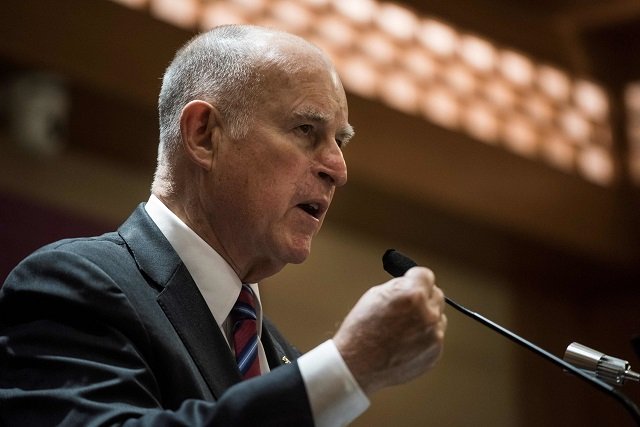 in this picture taken on june 8 2017 california governor jerry brown speaks during an energy policy conference in beijing china treated a us governor to a red carpet reception this week while president donald trump 039 s energy chief received a low key greeting a signal that beijing is ready to go around the white house in the battle against climate change photo afp