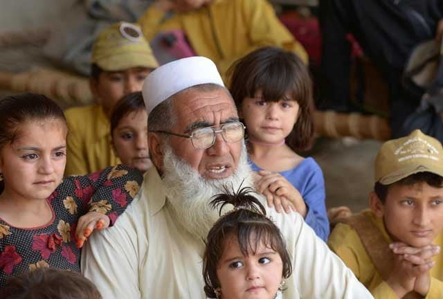 in this photograph pakistani father gulzar khan 57 who has 36 children from his three wives are surrounded by his children as he speaks during an interview with afp at his house in the northwestern town of bannu photo afp in this photograph pakistani father gulzar khan 57 who has 36 children from his three wives are surrounded by his children as he speaks during an interview with afp at his house in the northwestern town of bannu photo afp