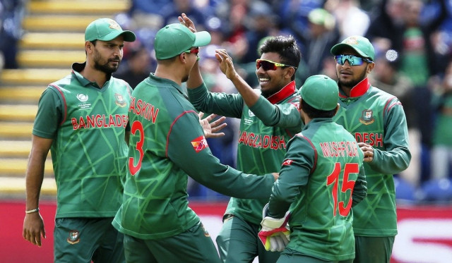 the tigers gave themselves a shot at a last four spot with a stunning five wicket win over new zealand in cardiff on friday photo afp the tigers gave themselves a shot at a last four spot with a stunning five wicket win over new zealand in cardiff on friday photo afp
