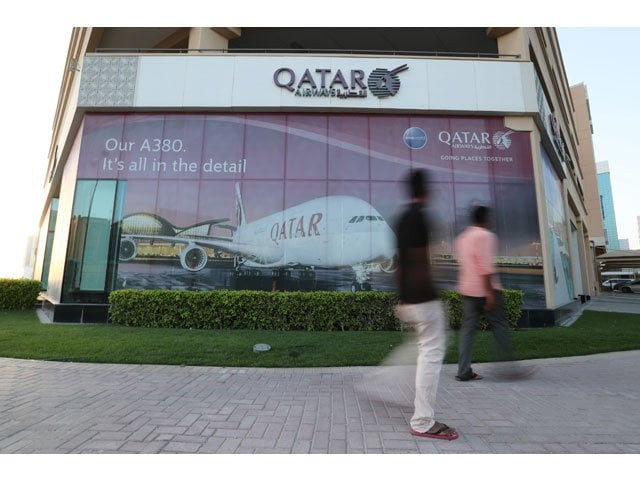 people walk past the qatar airways office in manama bahrain june 8 2017 picture taken june 8 2017 photo reuters people walk past the qatar airways office in manama bahrain june 8 2017 picture taken june 8 2017 photo reuters