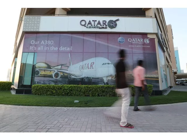 people walk past the qatar airways office in manama bahrain june 8 2017 picture taken june 8 2017 photo reuters people walk past the qatar airways office in manama bahrain june 8 2017 picture taken june 8 2017 photo reuters