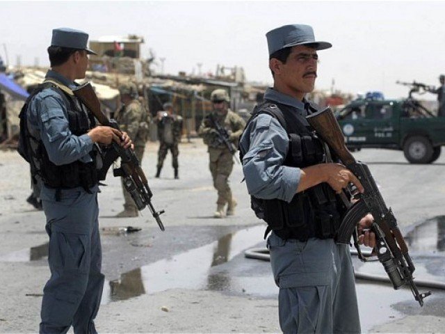 police personnel standing on guard in afghanistan photo afp