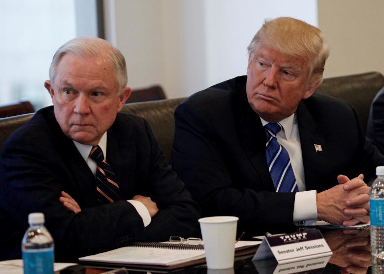 donald trump sits with jeff sessions r al at trump tower in manhattan new york us photo reuters