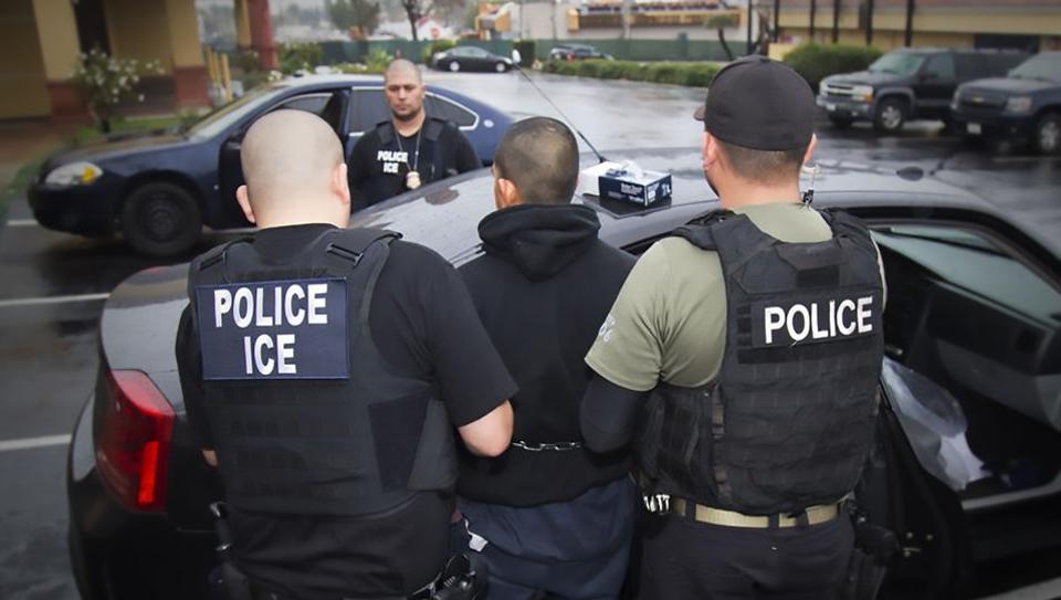 us immigration and customs enforcement ice officers detaining a suspect during an enforcement operation on february 7 2017 in los angeles california photo afp