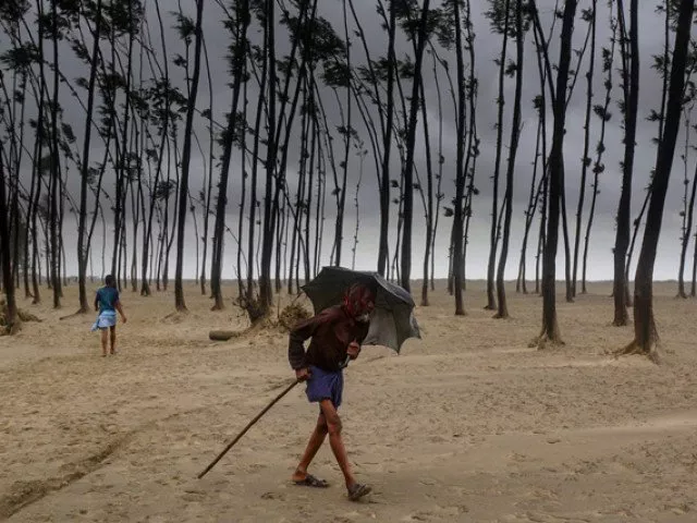 bangladeshi villager evacuates to a cyclone shelter on the coast in cox 039 s bazar district photo afp bangladeshi villager evacuates to a cyclone shelter on the coast in cox 039 s bazar district photo afp