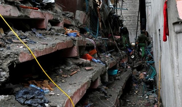 rubble of a six storey building that collapsed after days of heavy rain in nairobi kenya 2016 photo reuters thomas mukoya