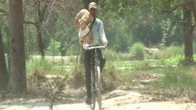 brij mohan taking body of his niece poonam back home from district hospital kaushambi on monday photo courtesy hindustan times brij mohan taking body of his niece poonam back home from district hospital kaushambi on monday photo courtesy hindustan times