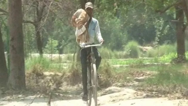 brij mohan taking body of his niece poonam back home from district hospital kaushambi on monday photo courtesy hindustan times brij mohan taking body of his niece poonam back home from district hospital kaushambi on monday photo courtesy hindustan times
