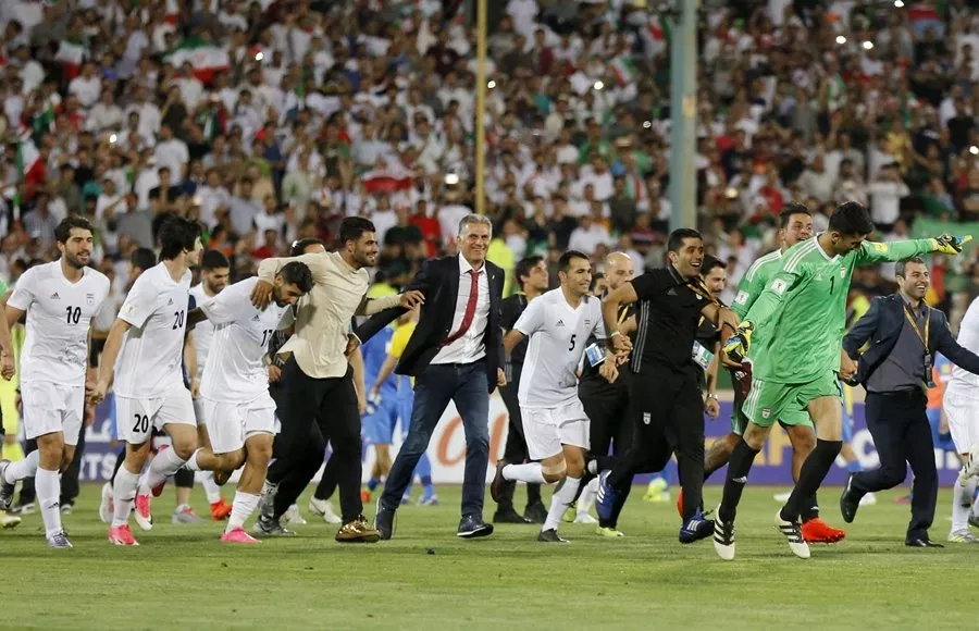 portuguese coach carlos queiroz c of the iranian national football team celebrates among players after winning the 2018 world cup qualifying football match between iran and uzbekistan at the azadi stadium in tehran on june 12 2017 iran won 2 0 photo afp portuguese coach carlos queiroz c of the iranian national football team celebrates among players after winning the 2018 world cup qualifying football match between iran and uzbekistan at the azadi stadium in tehran on june 12 2017 iran won 2 0 photo afp