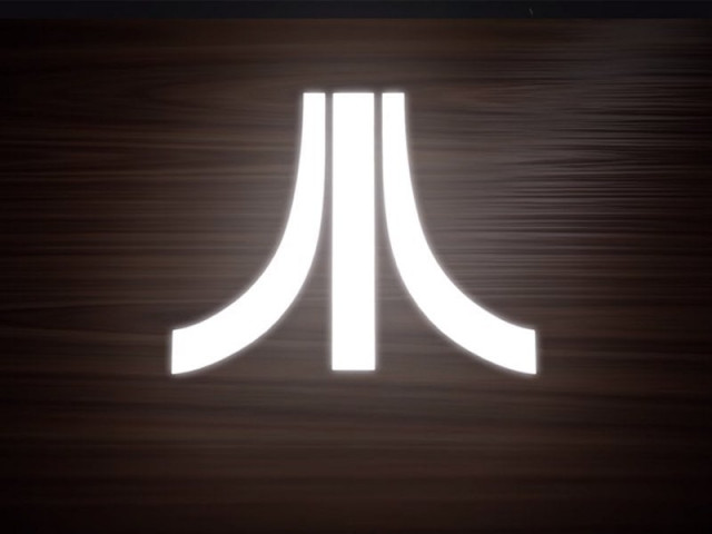 the video shows a device styled after the company s retro consoles with fake woodgrain and slatted black plastic on top the video shows a device styled after the company s retro consoles with fake woodgrain and slatted black plastic on top
