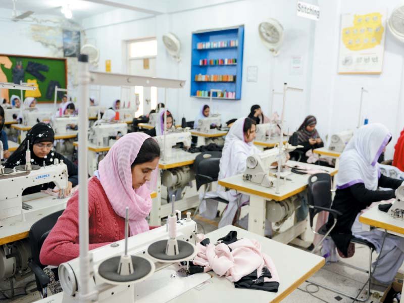 students stitch clothes in a class at punjab vocational training council photo courtesy tvet rsp