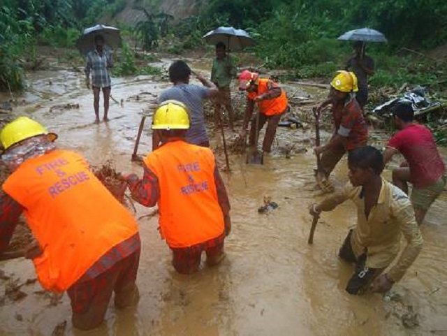 bangladeshi firefighters and residents search for bodies after the landslide photo afp