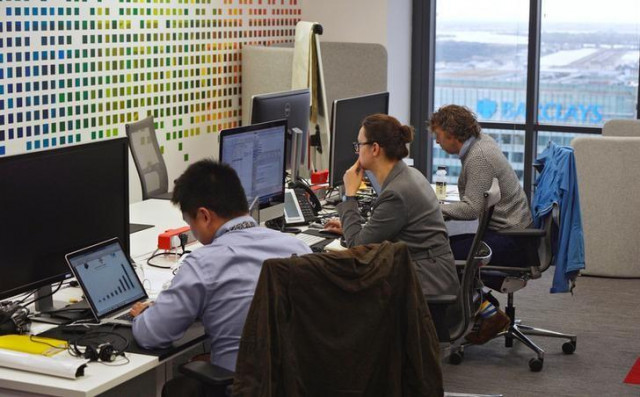 ubs employees work in the ubs quot fintech lab quot at canary wharf in london britain october 19 2016 photo reuters ubs employees work in the ubs quot fintech lab quot at canary wharf in london britain october 19 2016 photo reuters