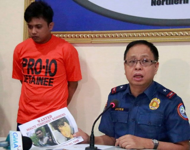 a police officer presents to the media one of the maute brothers mohammad noaim maute alias abu jahid who was arrested at a checkpoint in cagayan de oro city philippines june 15 2017 photo reuters a police officer presents to the media one of the maute brothers mohammad noaim maute alias abu jahid who was arrested at a checkpoint in cagayan de oro city philippines june 15 2017 photo reuters