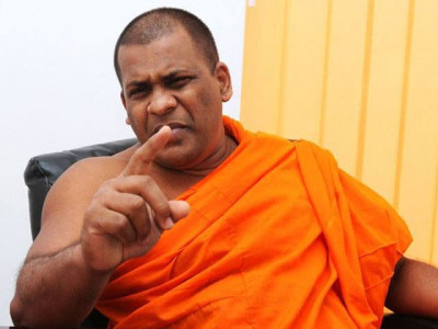 sri lanka seeks militant monk s arrest over hate crime