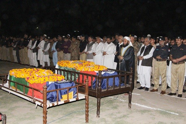 funeral prayers being offered for the slain policemen at the police lines in peshawar photo express