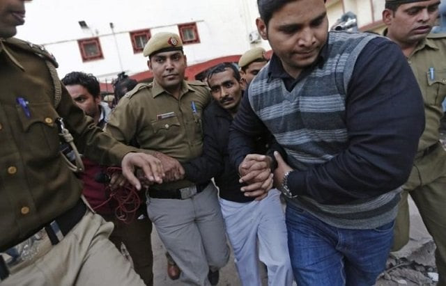 policemen escort driver shiv kumar yadav 3rd r in black jacket who is accused of a rape outside a court in new delhi december 8 2014 photo reuters policemen escort driver shiv kumar yadav 3rd r in black jacket who is accused of a rape outside a court in new delhi december 8 2014 photo reuters