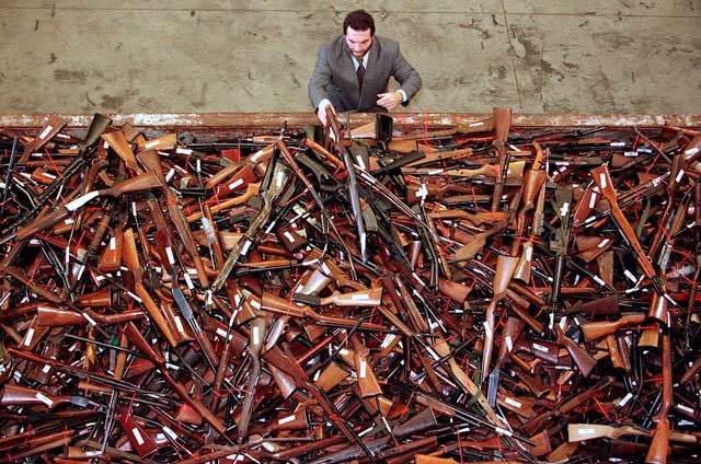 mick roelandts firearms reform project manager for the new south wales police looks at a pile of around 4 500 prohibited firearms that have been handed in over the past month under the australian government 039 s buy back scheme in sydney australia july 28 2017 photo reuters