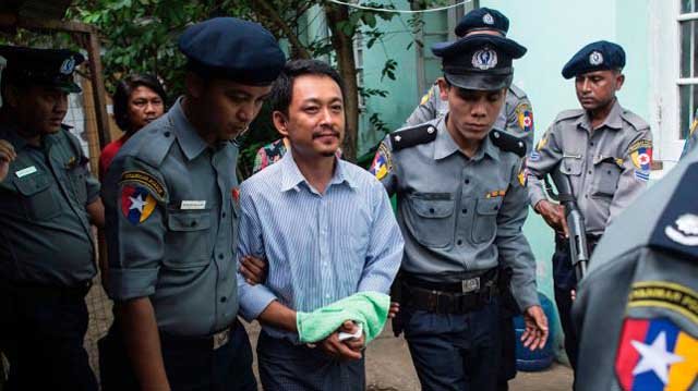 kyaw min swe c editor in chief of the voice daily newspaper arrives to hear the bahan township court for the third trial in yangon on june 16 2017 photo afp