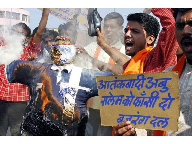 activists belonging to hindu hardliner group bajrang dal hold up signs demanding the death sentence for abu salem prime suspect of the 1993 mumbai bomb blasts during a demonstration in bhopal november 12 2005 photo reuters