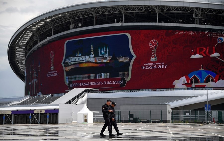 russian policemen patrol outside the kazan arena stadium in kazan russia on june 16 2017 ahead of the russia 2017 confederation cup football tournament photo afp