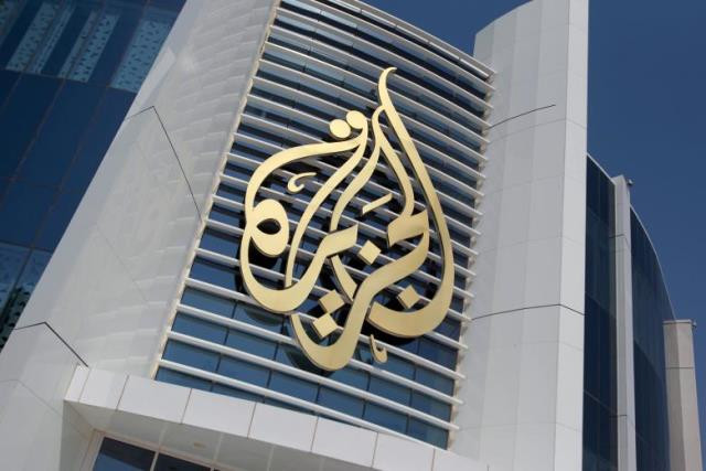 the logo of al jazeera media network is seen on its headquarters building in doha qatar june 8 2017 photo reuters the logo of al jazeera media network is seen on its headquarters building in doha qatar june 8 2017 photo reuters