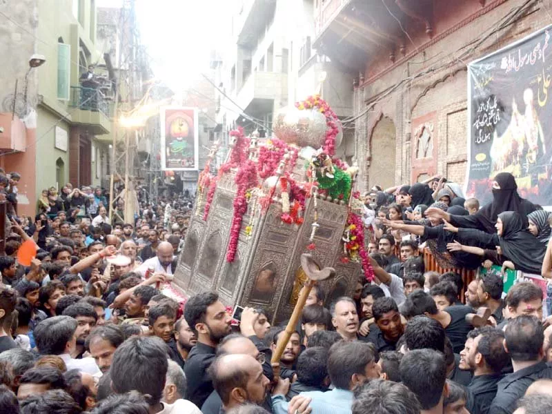 mourners carrying the tazia during the procession photo online mourners carrying the tazia during the procession photo online