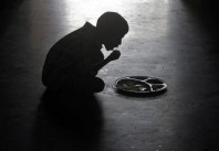 a boy eats at an orphanage photo reuters
