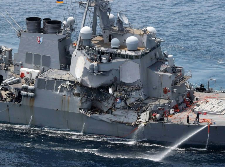 damage is seen on the guided missile destroyer uss fitzgerald off japan 039 s coast after it collided with a philippine flagged container ship on june 17 2017 photo afp