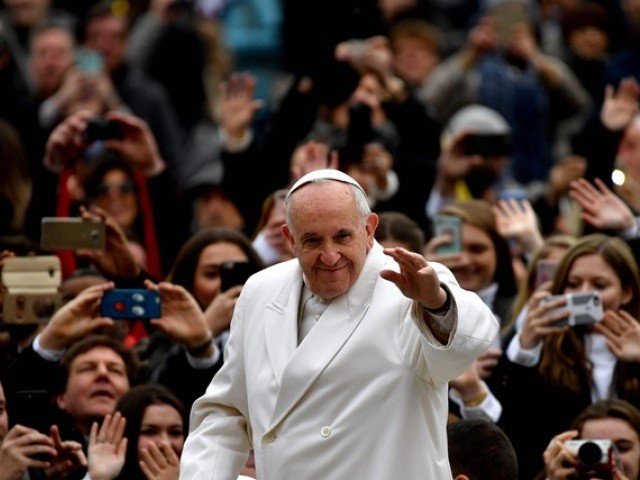 pope francis gestures as he arrives for his weekly general audience at paul vi hall on february 22 2016 at the vatican photo afp