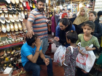unprivileged schoolchildren taken out for eid shopping