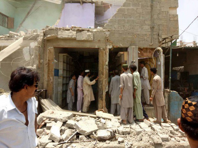 the structures that have been demolished include a three storey building shops and offices photo nni