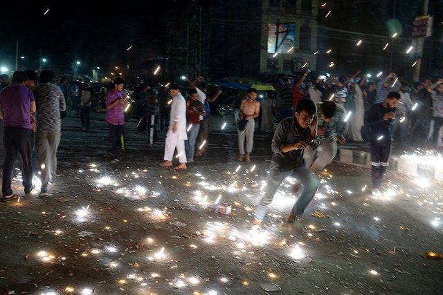 kashmirisplay with fireworks as they celebrate after pakistan won the champions trophy in srinagar photo afp
