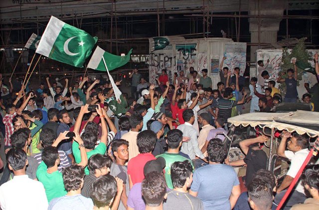 cricket lovers celebrate pakistan 039 s victory over india in icc champions trophy final at north nazimabad area of karachi late on sunday june 18 2017 photo online