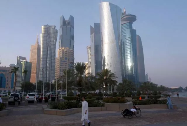 a man walks on the corniche in doha qatar june 15 2017 photo reuters a man walks on the corniche in doha qatar june 15 2017 photo reuters