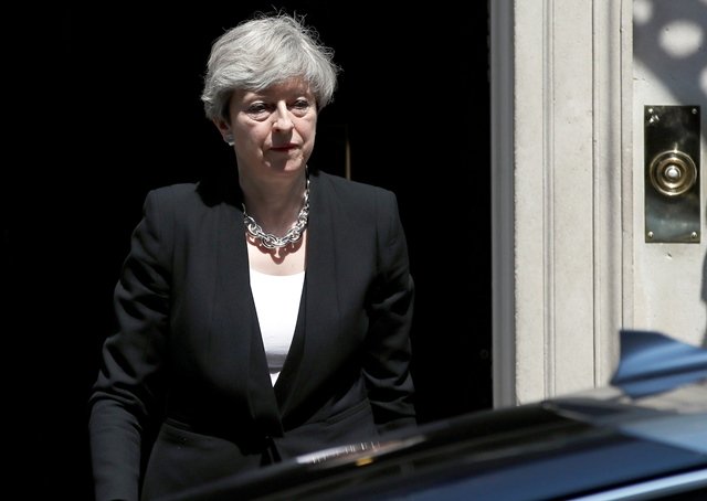 britain 039 s prime minister theresa may leaves after speaking outside 10 downing street following the attack at finsury park mosque in central london britain june 19 2017 photo reuters