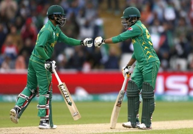 pakistan 039 s mohammad hafeez with babar azam after hitting a six photo reuters