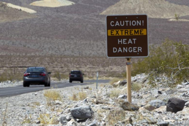 a sign warns of extreme heat as tourists enter death valley national park in california photo reuters a sign warns of extreme heat as tourists enter death valley national park in california photo reuters