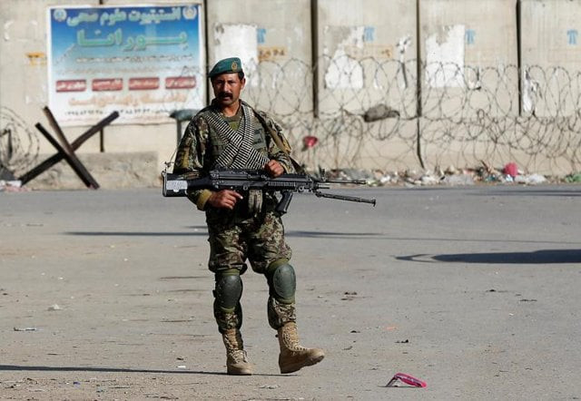 an afghan national army ana soldier keeps watch outside the bagram airfield entrance gate photo reuters an afghan national army ana soldier keeps watch outside the bagram airfield entrance gate photo reuters