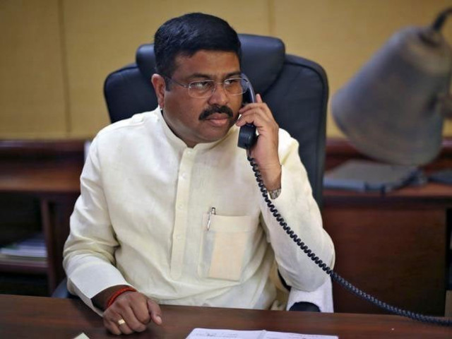 india 039 s oil minister dharmendra pradhan speaks on phone during an interview with reuters in new delhi india may 5 2016 photo reuters india 039 s oil minister dharmendra pradhan speaks on phone during an interview with reuters in new delhi india may 5 2016 photo reuters