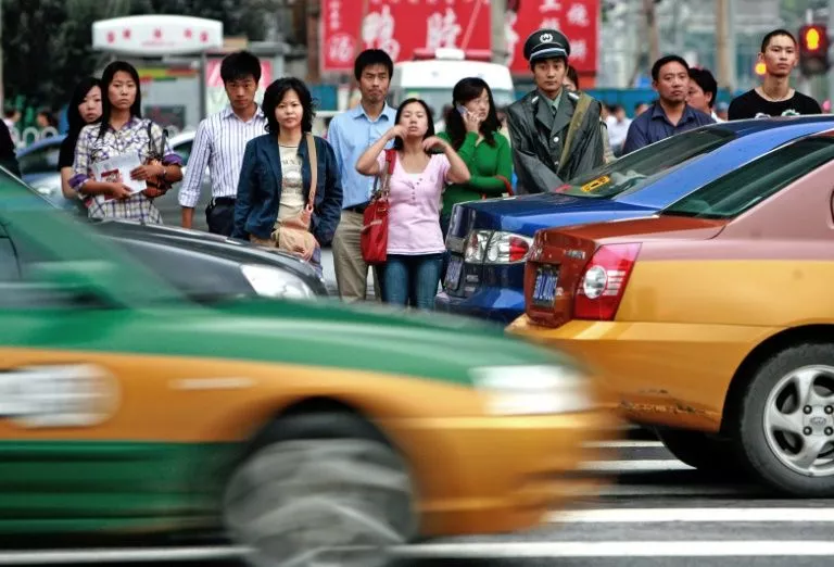 the technology has detected more than 6 000 instances of people crossing red lights since it was installed in early may in jinan capital of eastern shandong province photo afp the technology has detected more than 6 000 instances of people crossing red lights since it was installed in early may in jinan capital of eastern shandong province photo afp